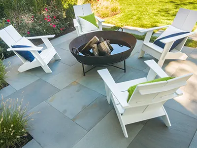 concrete-patio-with-chairs-and-firepit